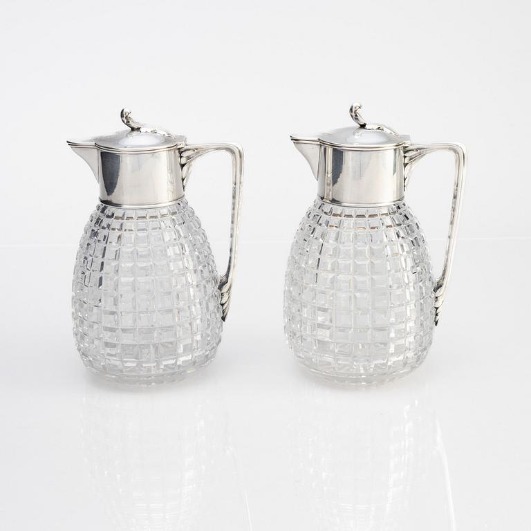 A pair of parcel-gilt silver and "hobnail" crystal decanters, W.A. Bolin, Stockholm 1920.