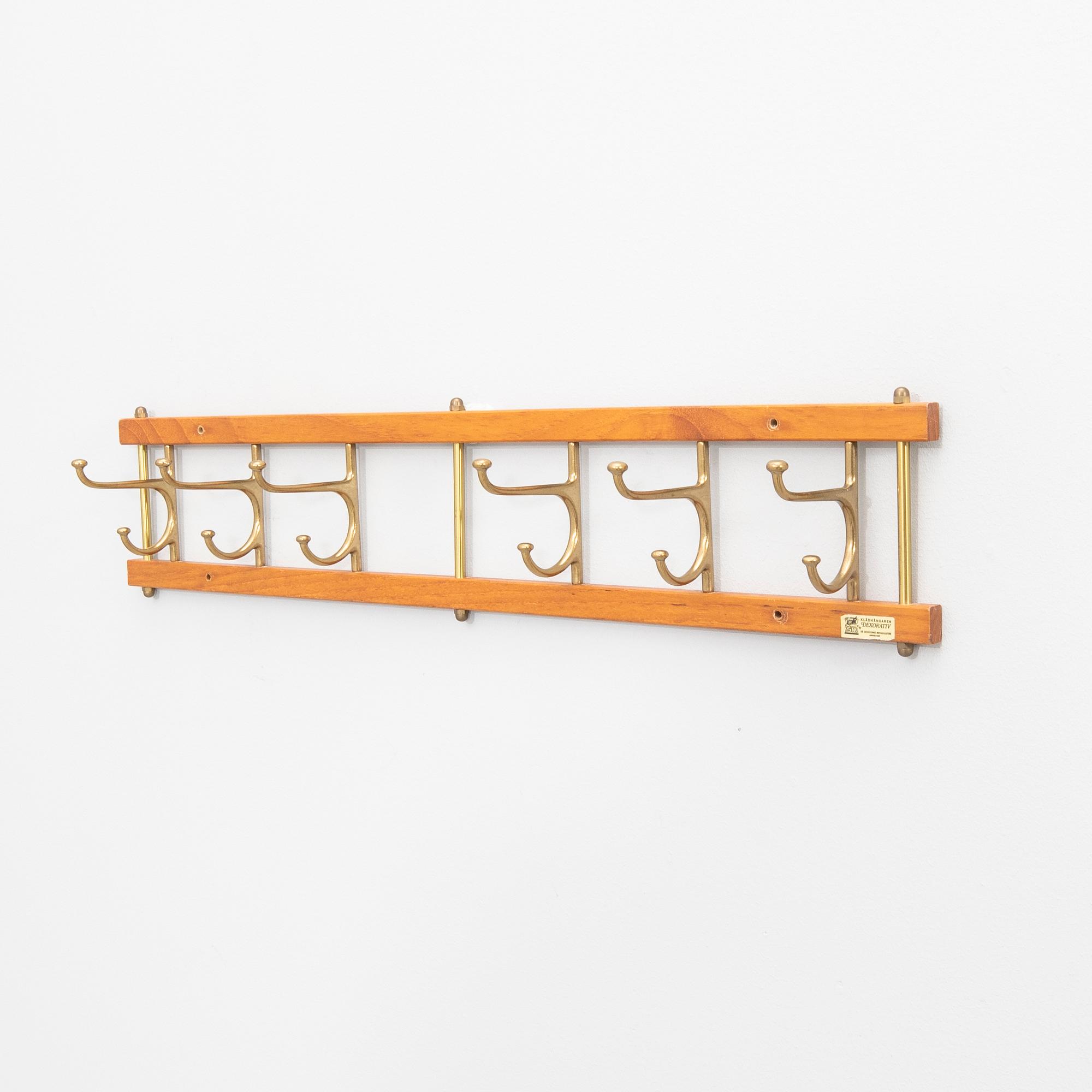 Klädhängare, "Dekorativ", Skoglunds metallgjuteri, Anderstorp, 1950/60-tal.