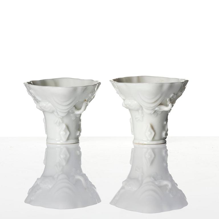 Two blanc de chine rhinoceros libation cups, Qing dynasty, Kangxi (1662-1722).