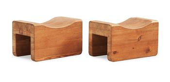 A pair of Axel Einar Hjorth pine stools, probably "Utö", Nordiska Kompaniet, Sweden 1930's.