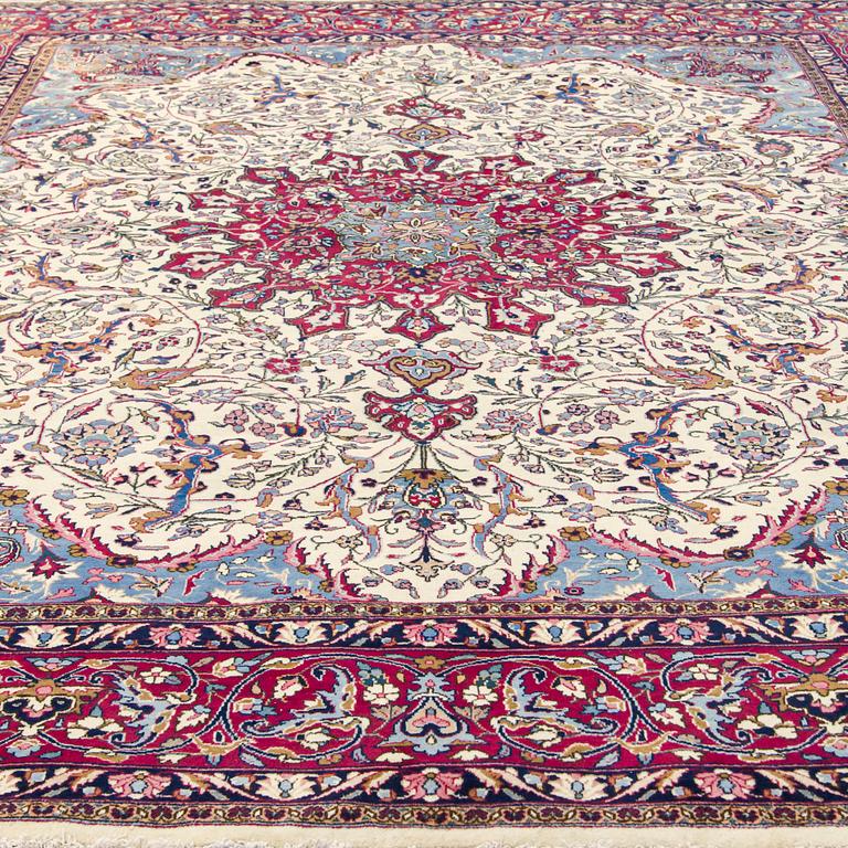 A Meshed rug, old, 380 x 300 cm.