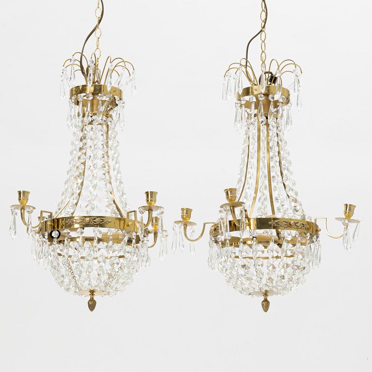 A contemporary pair of chandeliers.