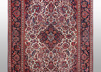 A rug, semi-antique Keshan, 217 x 134 cm.