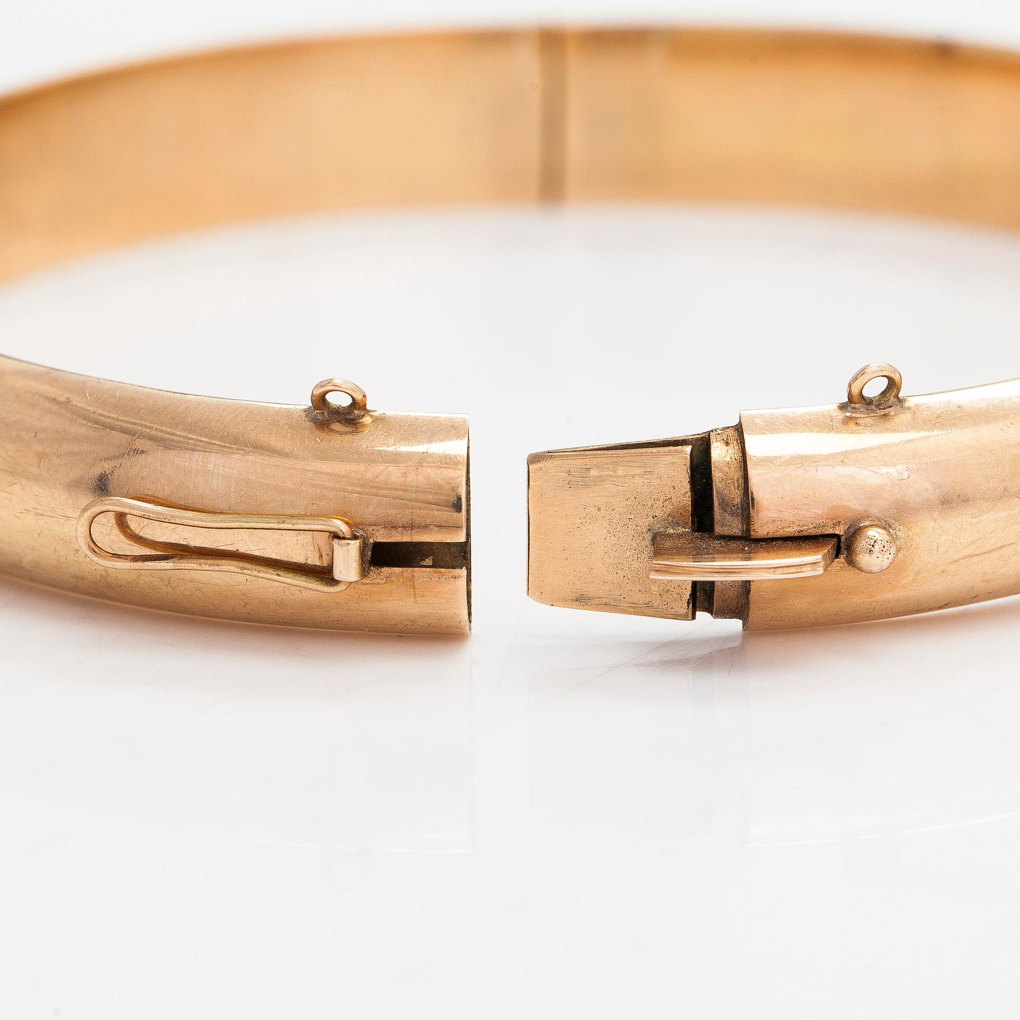 Armring, 14K guld, Aimo Koskinen, Helsingfors 1967.