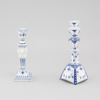 A porcelain candelabra and a candlestick from Royal Copenhagen, model "Musselmalet", 20th century.