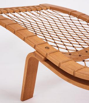 Hans J. Wegner, an oak chaise longue 'Hammock Chair GE2', Getama, Denmark, early 1960s.