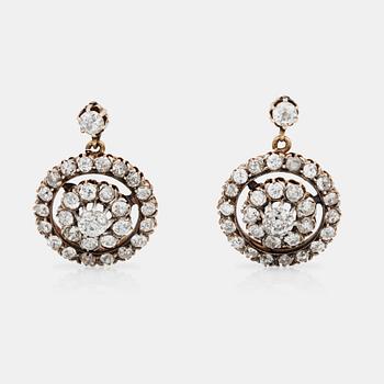 1029. A pair of earrings set with old-cut diamonds.