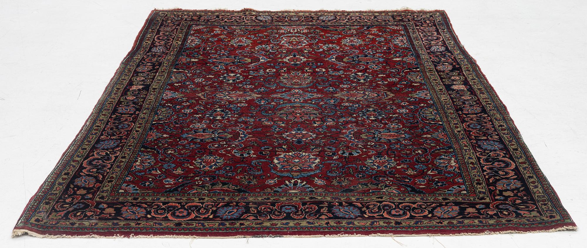A Kashan rug, c. 208 x 138 cm.