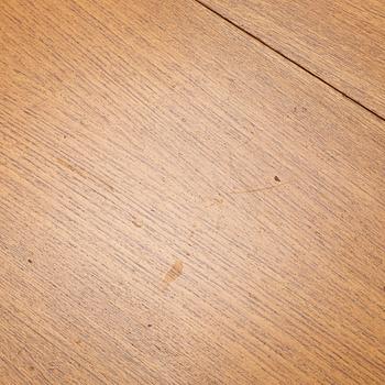 A mid20th century gate-leg table.