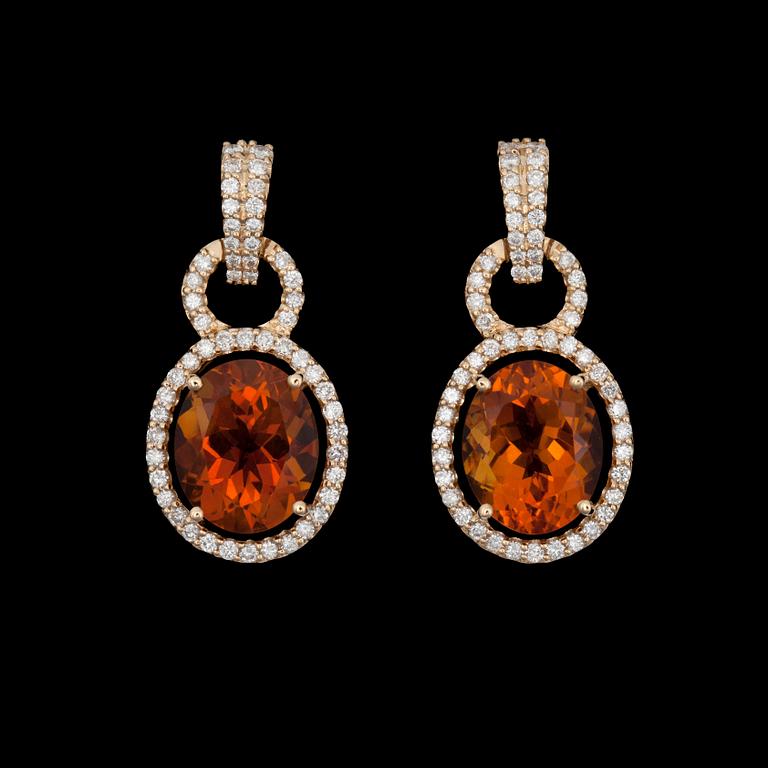 A pair if citrin earrings 6.72 cts, set with brilliant cut diamonds.