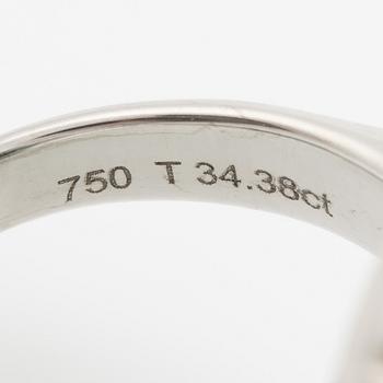 Ring, cocktail ring, 18K white gold with a large cabochon-cut green tourmaline and trapeze-cut diamonds.