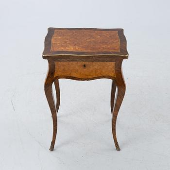 A Louis XV-style sewing table, 19th century.