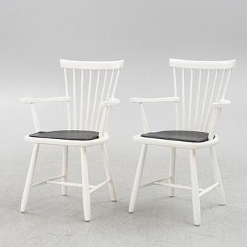 Carl Malmsten, A pair of armchairs,  'Lilla Åland', Stolab, 1999.