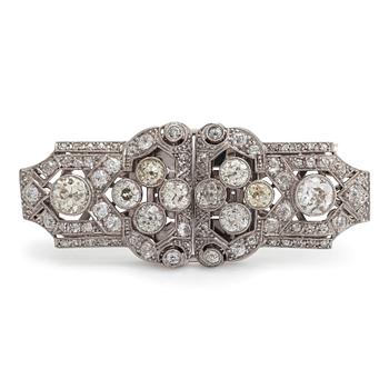 A 14K white gold Art Deco double clip brooch with old-cut diamonds approximately 4.90 cts in total. Austrian importmark.