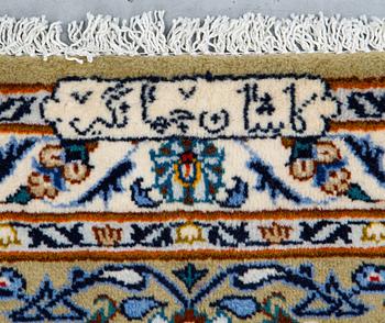 A carpet, Kashan signed, Janghair, ca 363 x 260 cm.