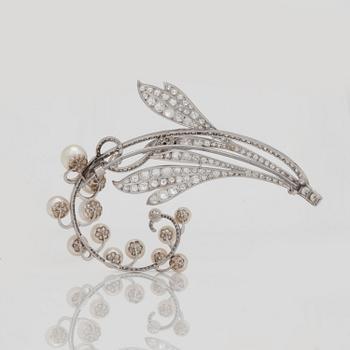 A tiara/brooch set with old cut diamonds and possibly cultured pearls, with noble provenance.