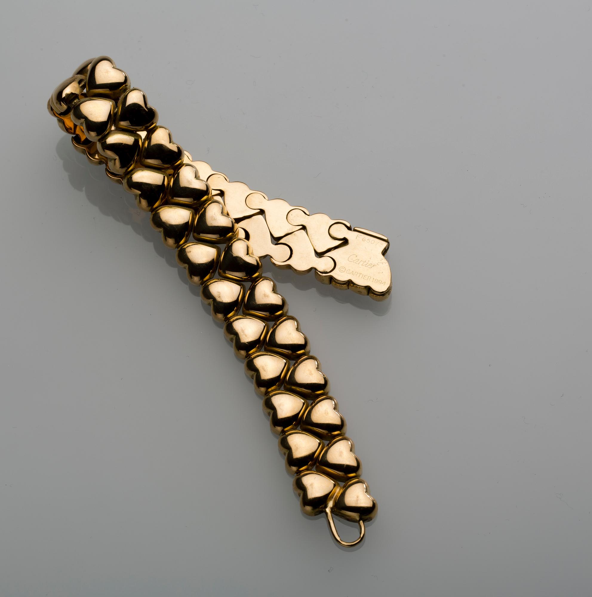 ARMLÄNK, 18 k guld, Cartier. Vikt ca 42 g.