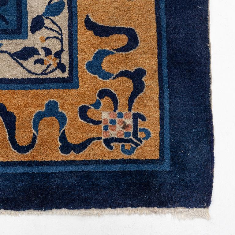 An antique Peking (Beijing) carpet, North China, c  435 x 311 cm.