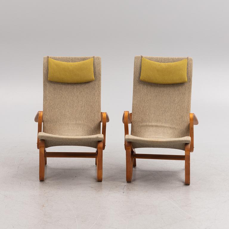 A pair of birch tree easy chairs. Mid 20th century.