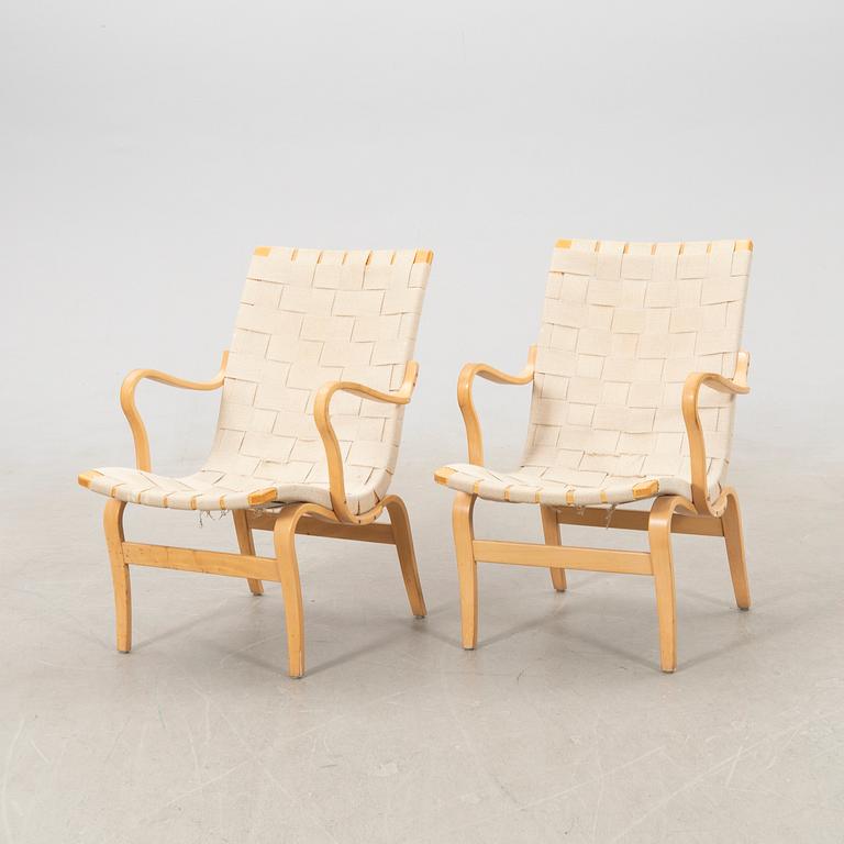 Bruno Mathsson, a pair of "Eva" armchairs for DUX, late 20th century.