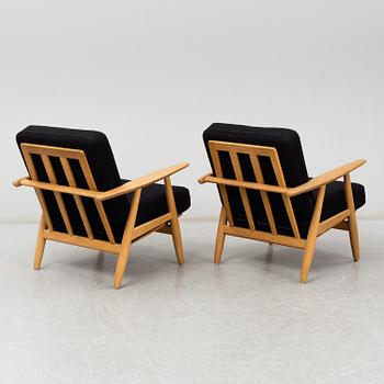 HANS J WEGNER, a pair of 'GE-240'/'Cigarren' oak easy chairs, Getama, Denmark.