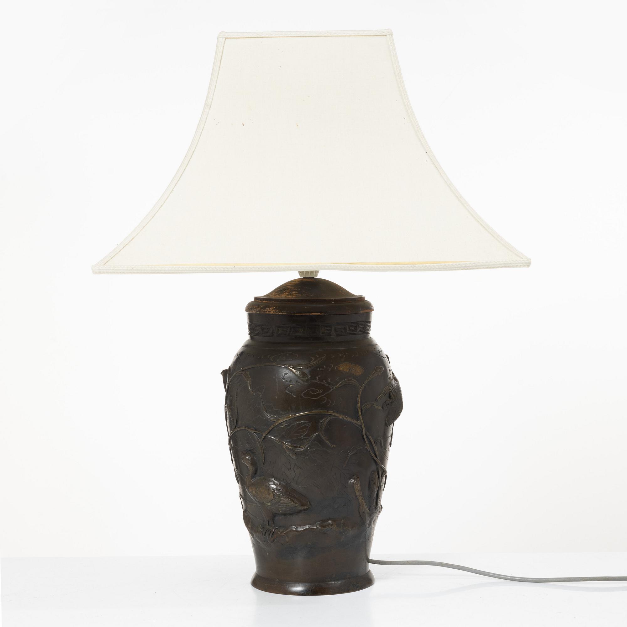 A Japanese bronze table lamp, 20th century.
