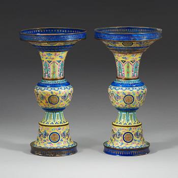 A pair of enamel on copper vases, Qing dynasty, 19th Century.