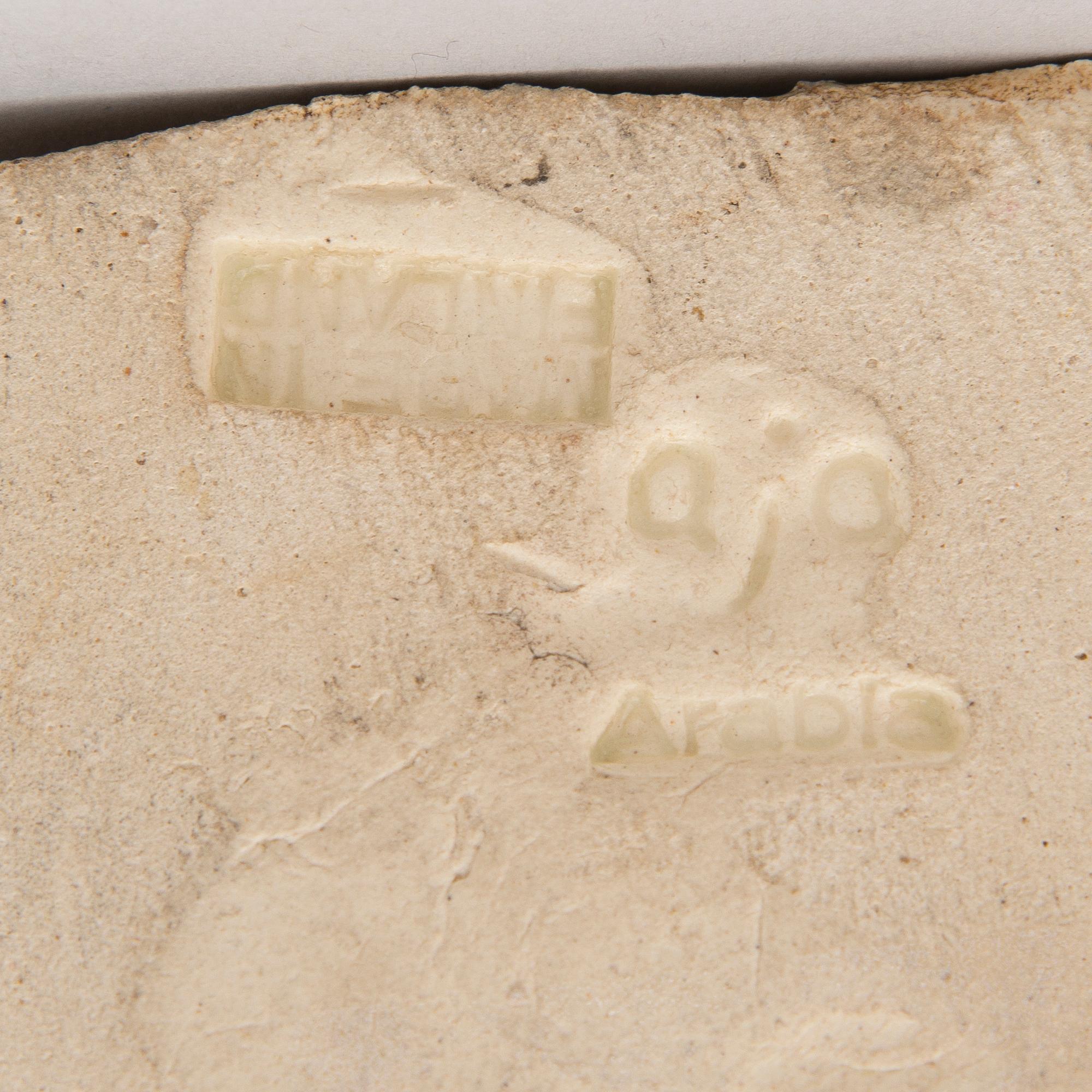 A 1930s ceramic sculpture signed Aja Arabia, Made in Finland.