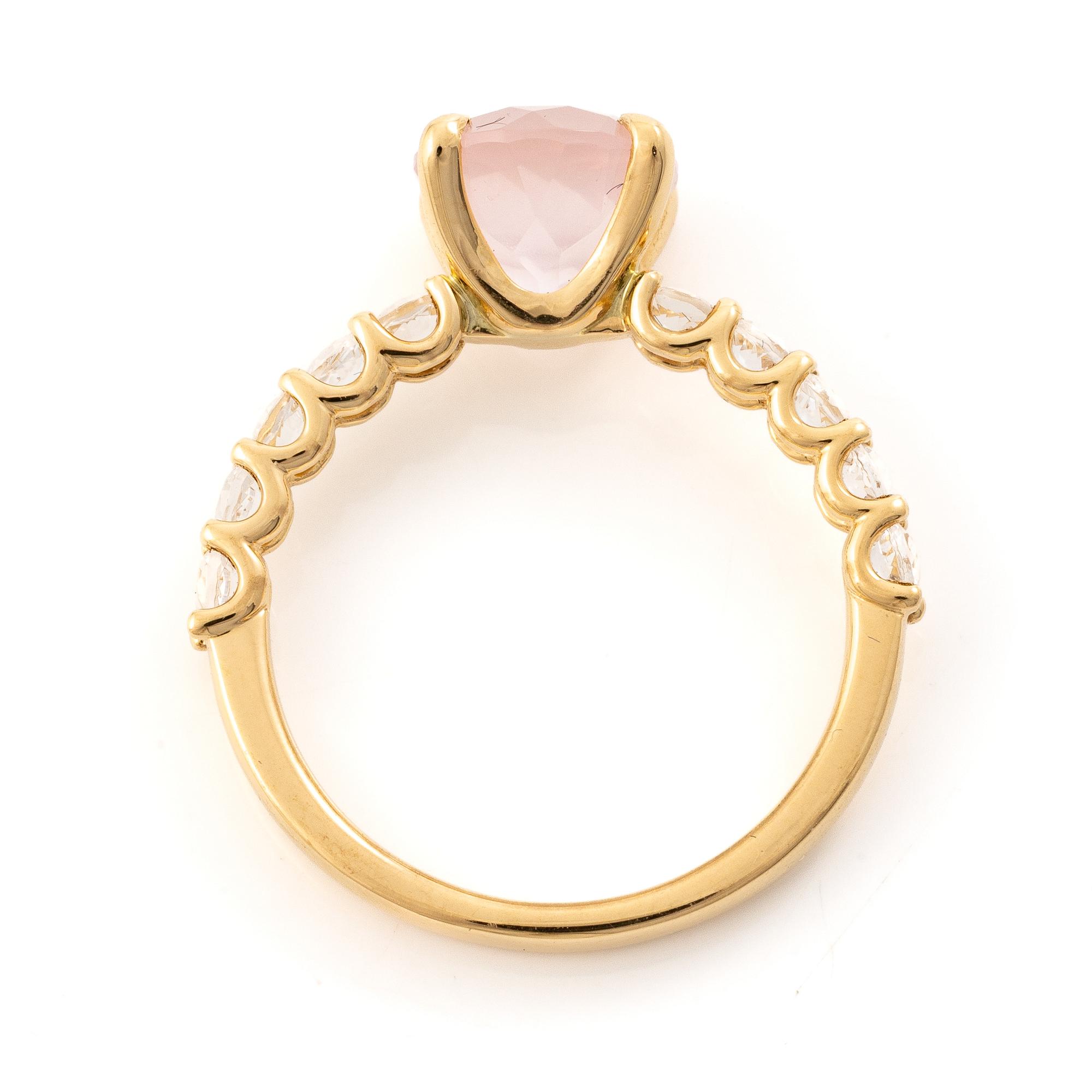 Mary Kay ring, 18K gold with a pink stone and white stones.