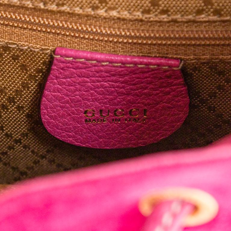 Gucci, a 'Bamboo' backpack.