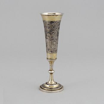 A Russian silver gilt and niello champagne flute, unidentified makers mark, Moscow 1843.