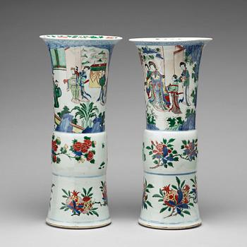 640. A matched pair of Gu-shaped wucai vases, Transition, 17th Century.