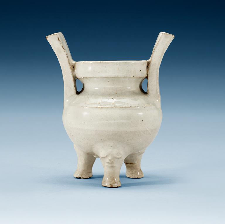 A pale grey-bluish glazed tripod censer with decor in relief, and archaistic mark, Ming dynasty (1368-1644).