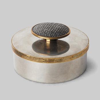 252. Estrid Ericson, a pewter and brass box with cover, Svenskt Tenn, Stockholm 1956.