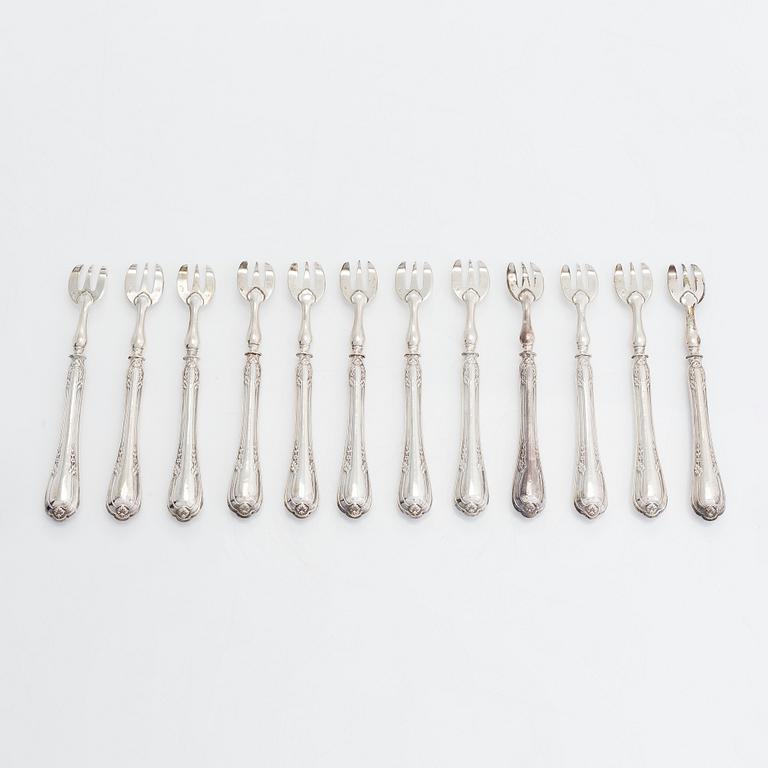 A set of twelve silver oyster forks. Maker's mark PDR with star, French export mark.