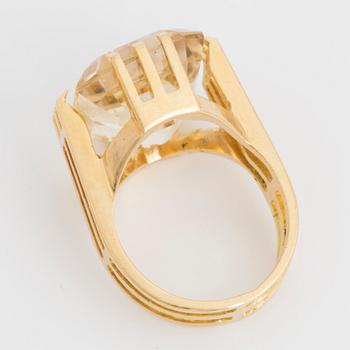 An emerald-cut citrine.