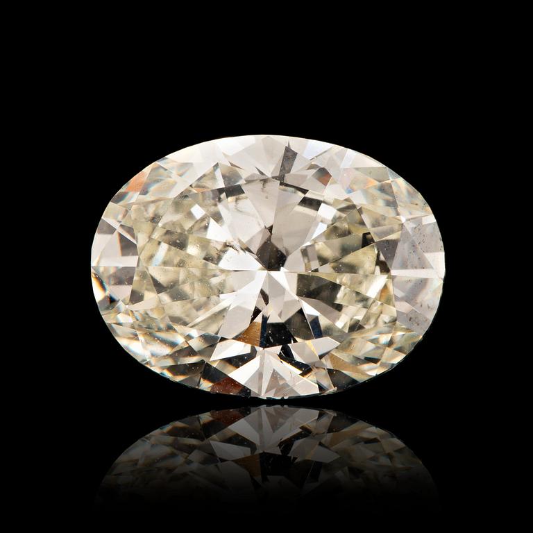 En oval briljantslipad diamant vikt 2.94 ct kvalitet ca K/L- si2/p1.