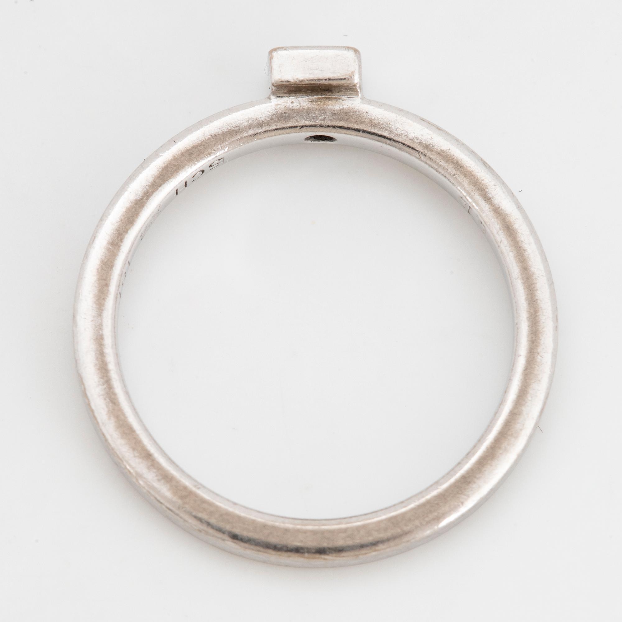 Princess-cut diamond ring.