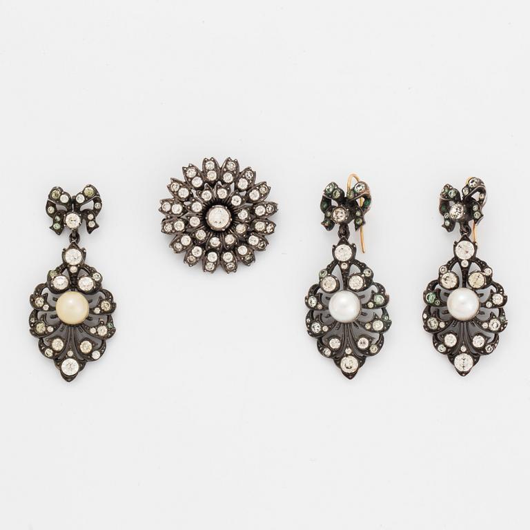 Earrings, brooch, and pendant silver with paste.