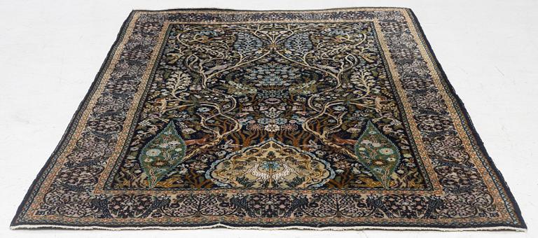 A figural Quum carpet, c. 179 x 125 cm.