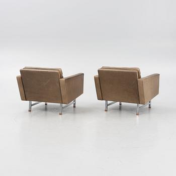 Karl Erik Ekselius, a pair of leather armchairs, JOC, Sweden, 1960's/70's.