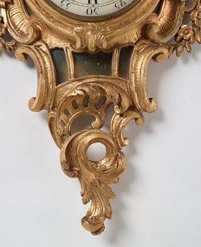 A Swedish rococo wall clock by Olof Berg, second half of the 18th century.