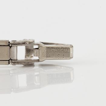 Bulova, wristwatch, platinum with diamonds, bracelet in steel.