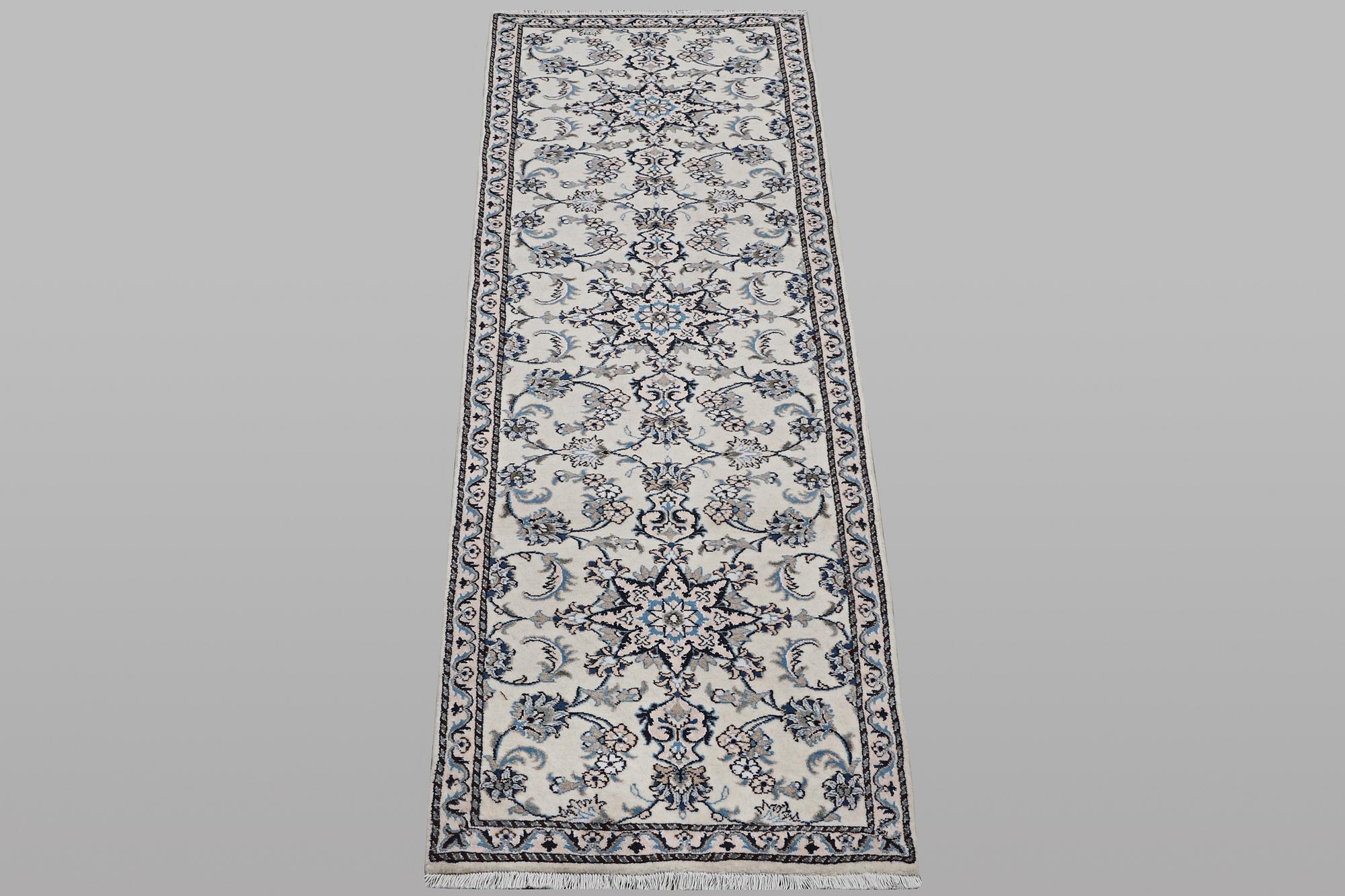 A runner carpet, Nain, part silk, ca 289 x 79 cm.