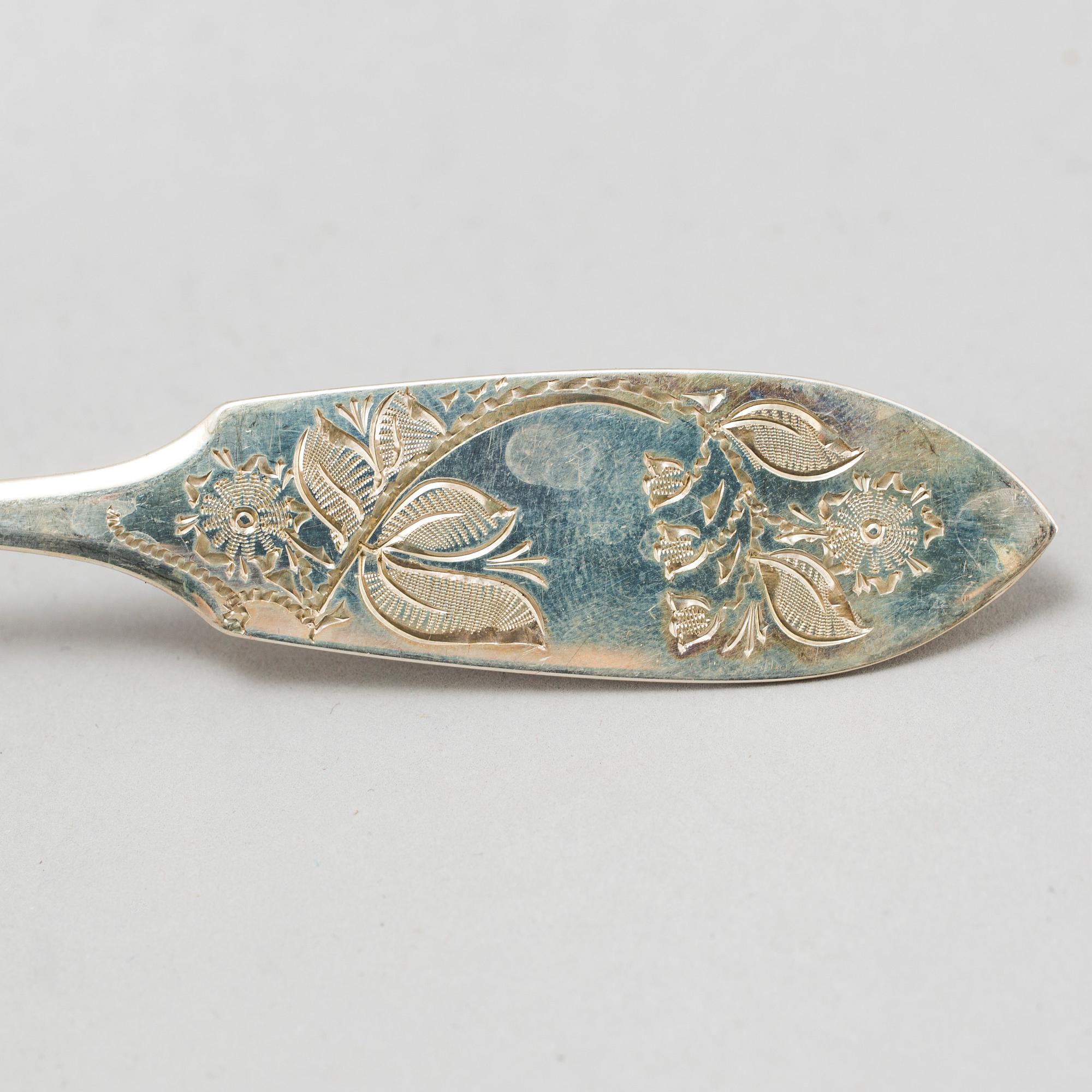 a lot of 24 silver spoons by C O Persson AB in Haparanda, Sweden. Weight ca 522 grams.