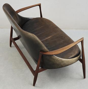 An Ib Kofod Larsen 'Elisabeth' palisander and black leather sofa, Christensen & Larsen, Denmark 1950-60's.