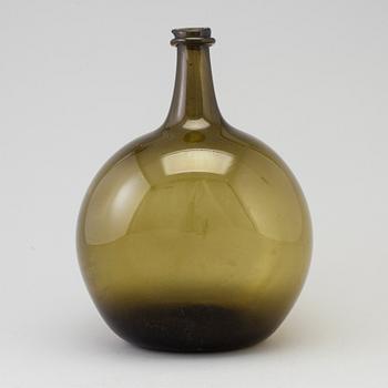 A 18th century glass bottle.