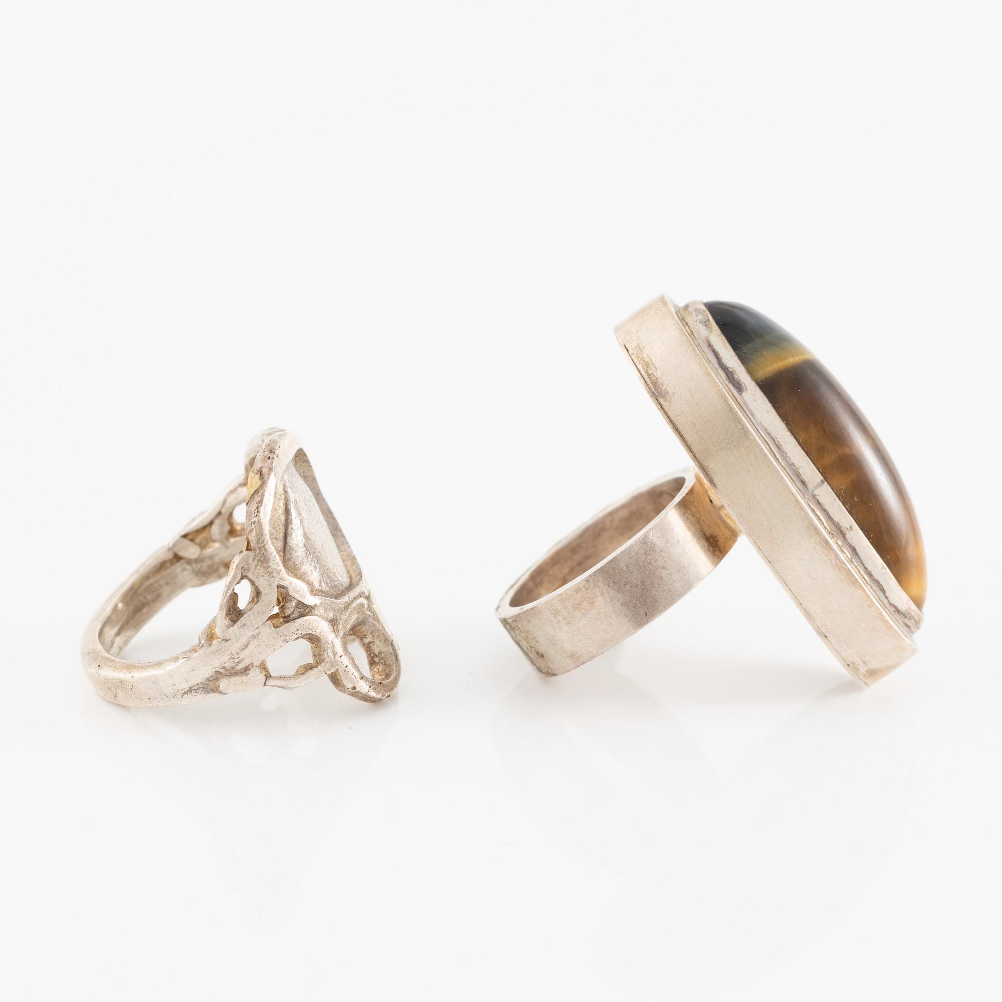 Lars Arby, fyra ringar, silver, en med tigeröga.
