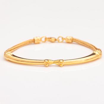 An 18K gold bracelet "Moose head", Kalevala koru 1999.