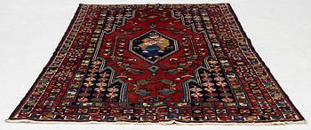 A semi-antique pictoral Mazlagan rug, Northwest Iran, c. 195 x 125 cm.